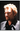 Portrait de Johnny Hallyday fait par Daniel Angeli dans les années 2000. Vendu sans encadrement. Pas de légende au dos.