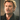 Portrait de Johnny Hallyday sur le tournage du clip de "Vivre pour le meilleur" en 1999 photographié par Daniel Angeli. Tirage d'époque en très bon état