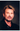 Portrait de Johnny Hallyday sur le tournage du clip de "Vivre pour le meilleur" en 1999 photographié par Daniel Angeli. Tirage d'époque en très bon état.