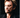 Portrait de Johnny Hallyday sur le tournage du clip de "Vivre pour le meilleur" en 1999 photographié par Daniel Angeli. Tirage d'époque en très bon état.