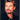 Portrait de Johnny Hallyday sur le tournage du clip de "Vivre pour le meilleur" en 1999 photographié par Daniel Angeli. Tirage d'époque en très bon état. 