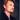 Portrait de Johnny Hallyday sur le tournage du clip de "Vivre pour le meilleur" en 1999 photographié par Daniel Angeli. Tirage d'époque en très bon état. 
