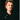Portrait de Johnny Hallyday sur le tournage du clip de "Vivre pour le meilleur" en 1999 photographié par Daniel Angeli. Tirage d'époque en très bon état. 